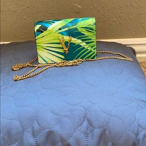 Versace tropical print mini chain bag $630.